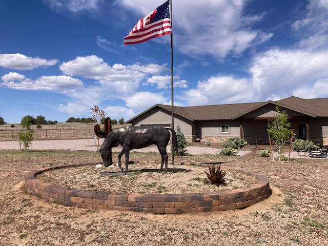 Complete revitalizing of pavers, clean, sand and reseal of approx. 3000 sq ft area, front and rear patios, firepit, driveway and planter in Prescott Williamson Valley Arizona  Thumbnail